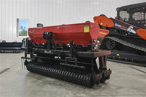 drill seeder for skid steer|spreader attachment for skid steer.